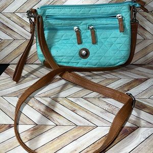 Stone Mountain quilted canvas wristlet/crossbody. Both straps are included.